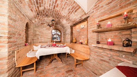 Pictures & Impressions • Der Grubacher: Hotel in Gerlos Cozy parlor in the vaulted cellar with brick walls