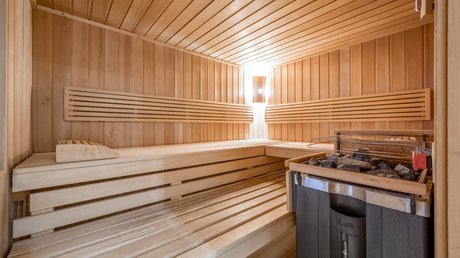 Pictures & Impressions • Der Grubacher: Hotel in Gerlos Sauna with fireplace and lounge areas