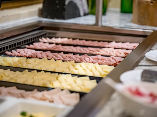 Eating on holiday in Gerlos • Der Grubacher: Eco Hotel in Tyrol Buffet with sausage, ham, and cheese platters