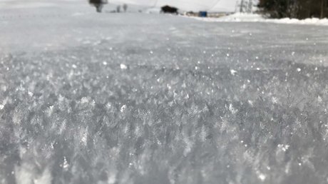 Pictures & Impressions • Der Grubacher: Hotel in Gerlos Close-up of sparkling snow crystals on a freshly groomed snow surface